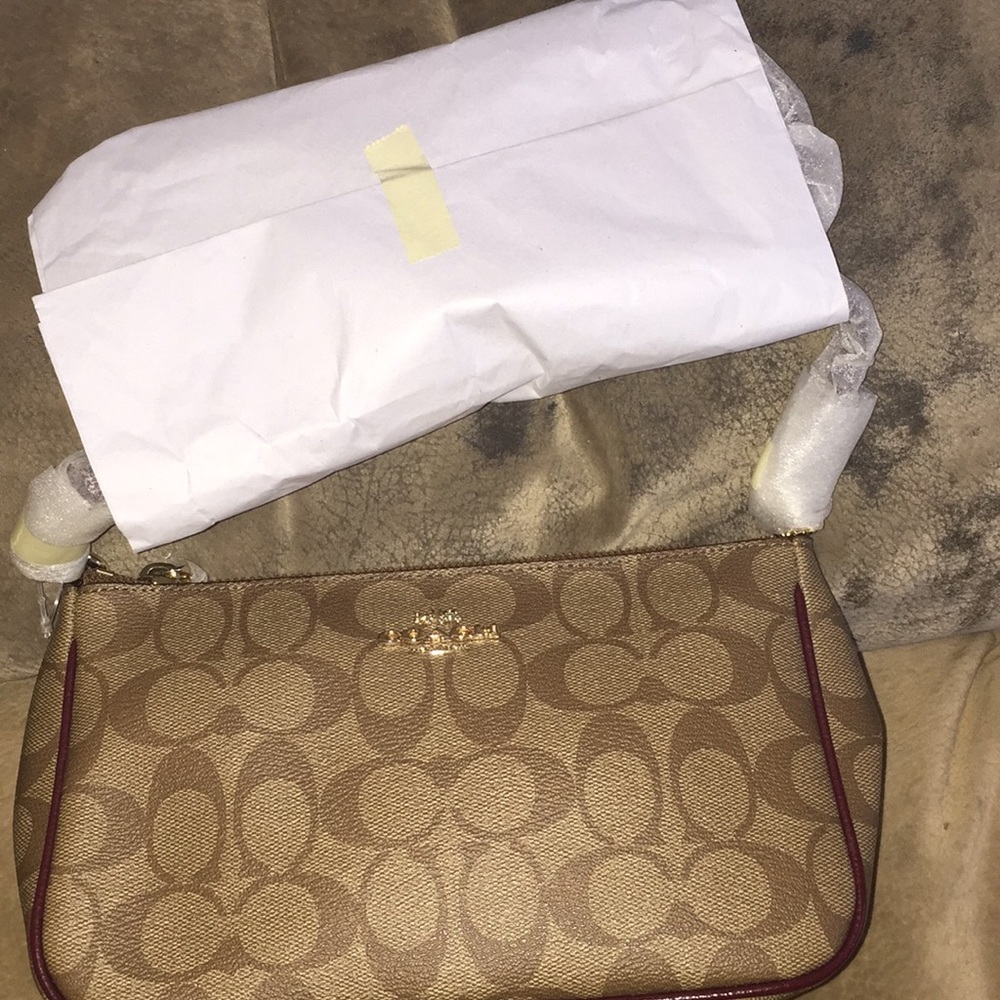 Brown coach crossbody bag